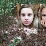A tip led authorities to these woods near Guntown where Alexandria Bain (left) and her younger sister, Kyliyah, were found with Adam Mayes on May 10. Officials said Mayes pulled a gun and shot himself as authorities moved in.