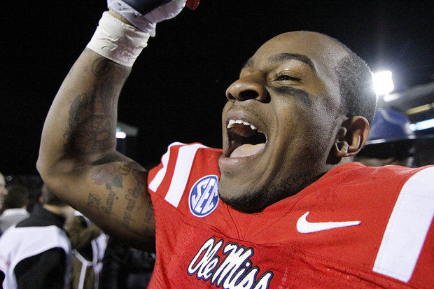 Mississippi linebacker Denzel Nkemdiche cheers after Mississippi defeated No. 25 Mississippi State 41-24 in an NCAA college football game in Oxford, Miss., Saturday, Nov. 24, 2012. (AP Photo/Rogelio V. Solis)