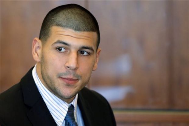 In this Oct. 9, 2013 file photo, former New England Patriots NFL football player Aaron Hernandez attends a pretrial court hearing in superior court in Fall River, Mass. Hernandez, who already faces a murder charge in a man's shooting death last year, was indicted Thursday, May 15, 2014, on new murder charges in an unrelated 2012 double slaying in Boston, police said. (AP Photo/Brian Snyder, Pool, File)