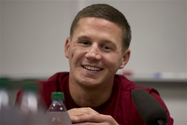 This photo taken May 13, 2014 shows Medically retired Marine Lance Cpl. Kyle Carpenter speaking to media at the Pentagon. The White House announced Monday that Carpenter, 24, will receive the medal of honor on June 19. He is the 15th recipient of the medal for service in Iraq and Afghanistan, the eighth still alive. (AP Photo/Carolyn Kaster)