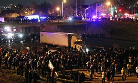 Protesters shut down I-44 at Grand Avenue in both directions in St. Louis on Monday, Nov. 24, 2014. (AP Photo/St. Louis Post-Dispatch, J.B. Forbes)
