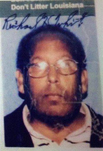 This drivers license image released by the Jefferson Parish Sheriff's Office shows Richard White. The Jefferson Parish Sheriff's office said in a statement that 63-year-old White was pronounced dead Saturday, March 21, 2015, at a local hospital. Sheriff Newell Normand said White -- who was shot three times by one of Normand's lieutenants Friday after approaching a security checkpoint at New Orleans' international airport, spraying insecticide and brandishing a machete -- was also carrying a bag loaded with six Molotov cocktails: six Mason jars with cloth wicks soaked in gasoline. (AP Photo/Jefferson Parish Sheriff's Office)