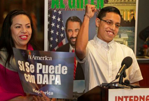 Alma Rodriguez, left, stands besides her son, Steven Arteaga Rodriguez, right, as he speaks during an event on DACA and DAPA Immigration Relief at the Houston International Trade Center, Tuesday, Feb. 17, 2015, in Houston. The White House promised an appeal Tuesday after a federal judge in Texas temporarily blocked President Barack Obama's executive action on immigration and gave a coalition of 26 states time to pursue a lawsuit aiming to permanently stop the orders. (AP)