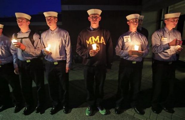 Maine Maritime Academy students attend a vigil of hope for the missing crew members of the U.S. container ship El Faro, Tuesday evening, Oct. 6, 2015, in Castine, Maine. The Coast Guard has concluded the vessel sank near the Bahamas during Hurricane Joaquin and ended the search for the missing crew members today. (AP Photo/Robert F. Bukaty)