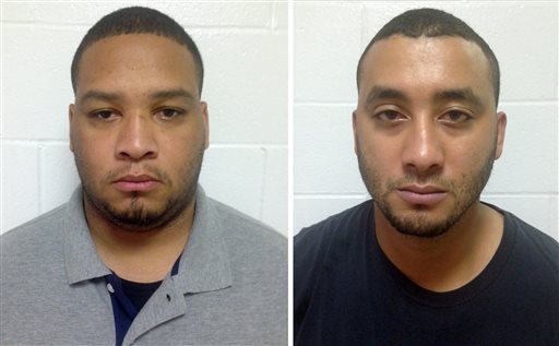 In this photo combination shows booking photos provided by the Louisiana State Police, Marksville City Marshal Derrick Stafford, left, and Marksville City Marshal Norris Greenhouse Jr., both were arrested on charges of second-degree murder and attempted second-degree murder in the fatal shooting of Jeremy Mardis, a six-year-old autistic boy, on Tuesday, Nov. 3, 2015 in Marksville, La. The shooting also wounded Mardis' father, Chris Few. (Louisiana State Police via AP) 