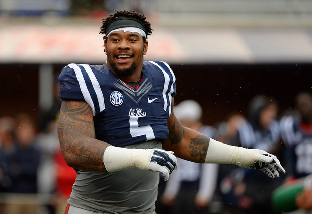 Ole Miss defensive lineman Robert Nkemdiche was charged with marijuana possession Monday after an incident at an Atlanta hotel in which the Rebel star fell 15 feet from a window. Nkemdiche will not play in the Sugar Bowl against Oklahoma State and will enter the NFL draft. Thomas Graning/The Associated Press