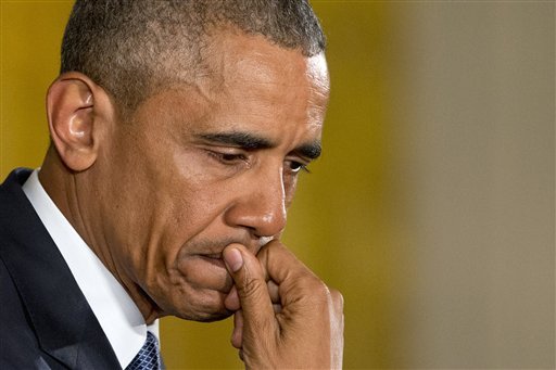An emotional President Barack Obama pauses as he speaks about the youngest victims of the Sandy Hook shootings, Tuesday, Jan. 5, 2016, in the East Room of the White House in Washington, where he spoke about steps his administration is taking to reduce gun violence. (Jacquelyn Martin/The Associated Press)