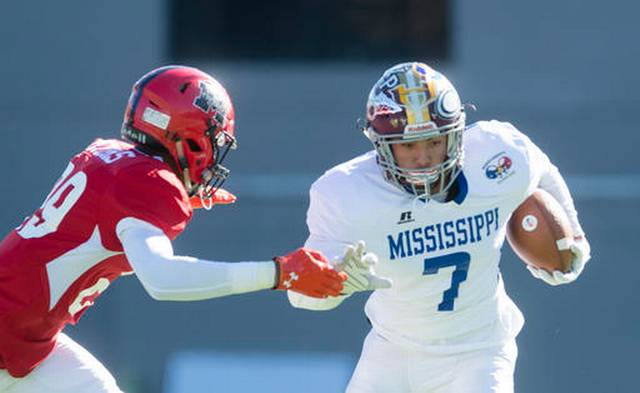 Mississippi All Star Tyrese Fryfogle of George County runs downfield as Alabama All Star Jordyn Peters of Muscle Shoals moves in to tackle him during the Alabama vs. Mississippi All-Star high school football game at the Cramton Bowl in Montgomery, Ala., on Saturday, Dec. 10, 2016. The Montgomery Advertiser via AP Albert Cesare