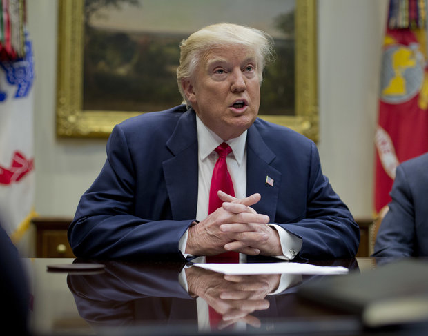 In this Feb. 27, 2017 photo, President Donald Trump speaks in the Roosevelt Room of the White House in Washington. Trump is accusing former President Barack Obama of having Trump's telephones "wire tapped" during last year's election, but Trump isn't offering any evidence or saying what prompted the allegation. (AP Photo/Pablo Martinez Monsivais, File)