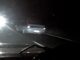 A driver believed to be under the influence is filmed after passing a police car — and narrowly missing a head-on collision with another vehicle — in Queensland, Australia. (Queensland Police/Zenger)