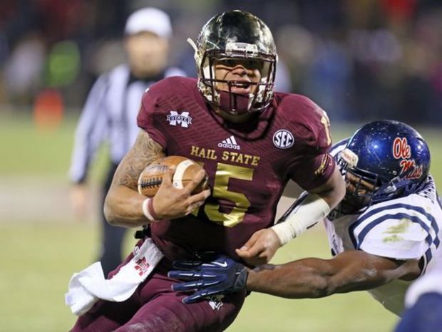 Mississippi State's Dak Prescott, pictured here in last year's win over Ole Miss in the Egg Bowl, is one of only a handful of returning starters at quarterback in the SEC.