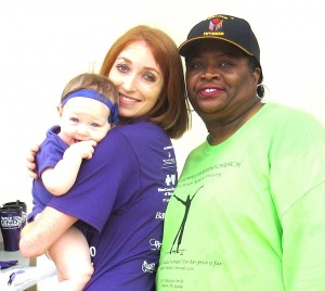 Mississippi Chapter Alzheimer’s Association Program Coordinator Sara Murphy and daughter (R) pose with Chapter board member Gail M. Brown.