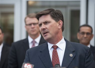 Mississippi State Auditor Stacey Pickering speaks to reporters following the arraignment of former Mississippi Corrections Commissioner Chris Epps and businessman Cecil McCrory, Thursday, Nov. 6, 2014 at the U.S. Courthouse in Jackson, Miss. Federal prosecutors allege that former Mississippi Corrections Commissioner Christopher Epps accepted more than $1 million in bribes over more than six years. (AP Photo/The Clarion-Ledger, Joe Ellis)