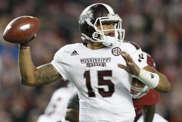 Mississippi State quarterback Dak Prescott throws the ball against Alabama during the second half of an NCAA college football game Saturday, Nov. 15, 2014, in Tuscaloosa, Ala. Alabama won 25-20. (AP Photo/Brynn Anderson)