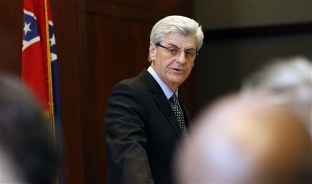 Gov. Phil Bryant explains facets of his 2016 Executive Budget Recommendation before agency and department heads and local media, Monday, Nov. 17, 2014, in Jackson, Miss. Bryant's budget calls for increasing funding for public education by over $52 million and providing a tax credit for "working Mississippi families." (AP Photo/Rogelio V. Solis)
