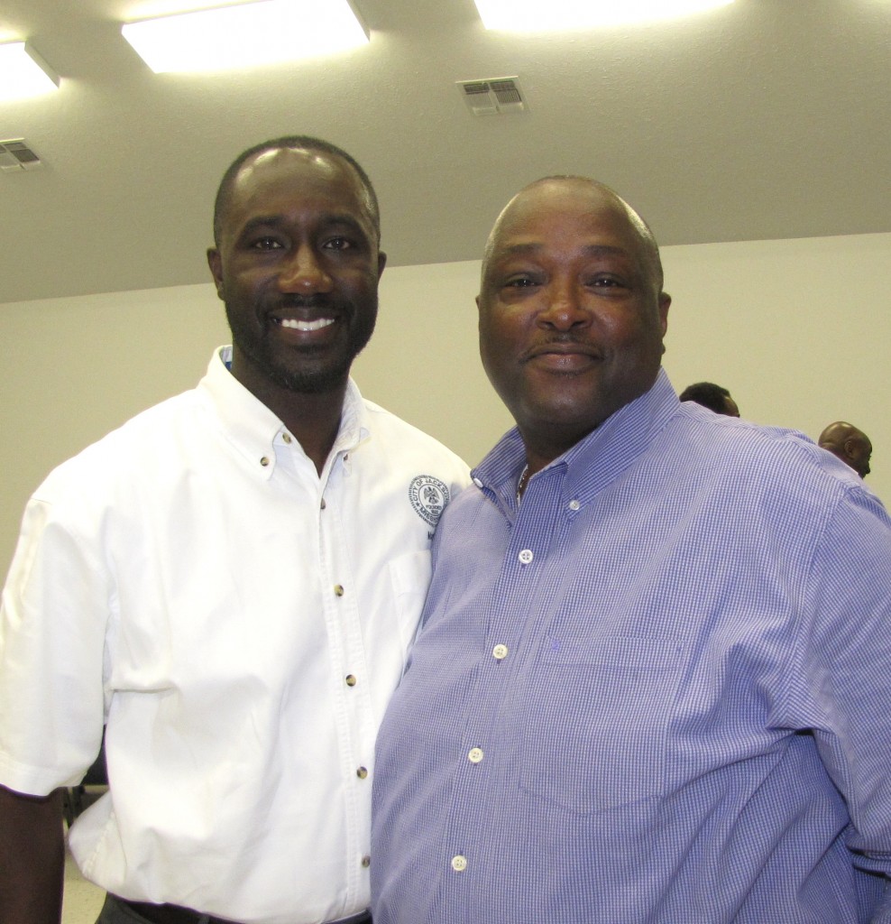 The mayor with Pastor Arthur Sutton of Progressive Missionary Baptist Church