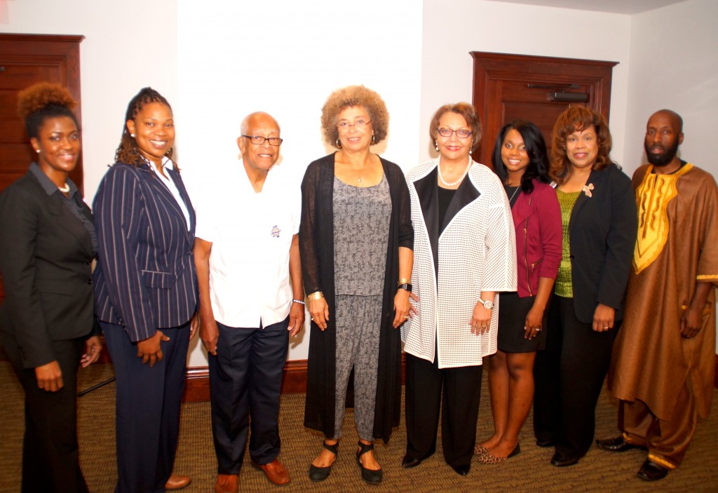 Dr. Daphne R. Chamberlain, chair of Tougaloo’s Dept of History and Political Science; Dr. S. Nicole Cathey, Assistant professor of political science; Hollis Watkins Muhammad, chair of the Veterans of the Mississippi Civil Rights Movement Inc.; Professor Angela Davis; Tougaloo President Beverly W. Hogan; Jarmyra Davis, Tougaloo Chapter MS NAACP 2015-2016; Cynthia Goodloe Palmer, executive director of VMCRM; and Dr. Michael Williams, dean of Tougaloo’s Division of Social Sciences. PHOTO BY JAY JOHNSON