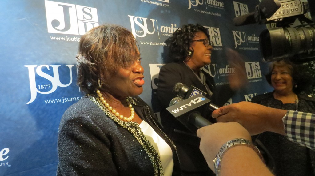 Provost Dr. Evelyn Leggette speaks to the media as Dr. Elayne Hayes-Anthony (center) and JSU president Carolyn Meyers talk following the journalism school announcement. Photo by Gail Brown