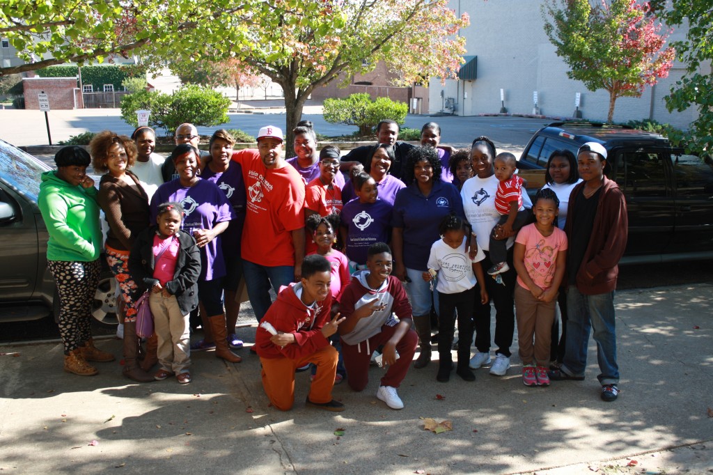 Members of Vision Outreach Church and Ministries gather at Smith Park Saturday.