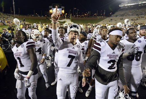 Members of Mississippi State celebrate their 31-13 victory over Missouri in an NCAA college football game on Thursday, Nov. 5, 2015, in Columbia, Mo. (AP Photo/L.G Patterson)