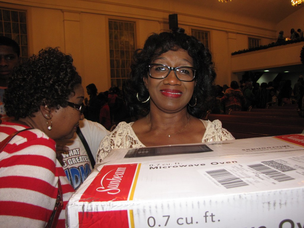 First time attendant Dorothy Moore of Progressive M. B. Church was stunned to be awarded a microwave. Photo by Janice K. Neal-Vincent