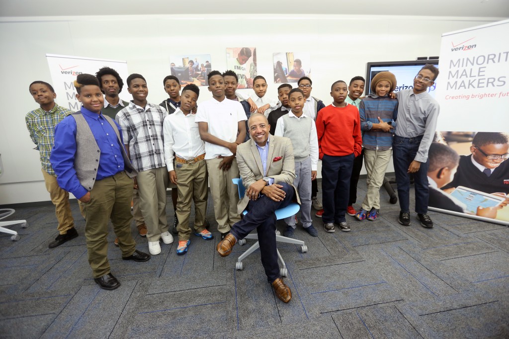 Music Executive Kevin Liles poses with Blackburn Middle School students and one of their college mentors who participated in a session of Verizon’s Minority Male Makers Program at Jackson State University Dec. 10. 