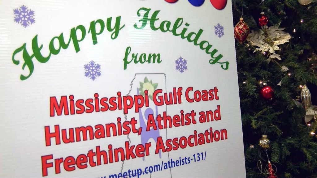 A humanist group called off its planned lawsuit over a Nativity scene in the Harrison County courthouse after county officials allowed another group to post a sign next to the Nativity scene. WLOX photo