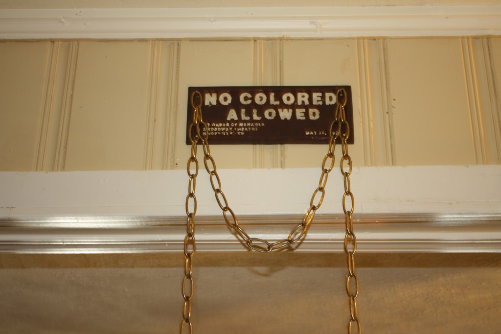 Memorabilia from segregated times hangs in Brown-Wright’s home.