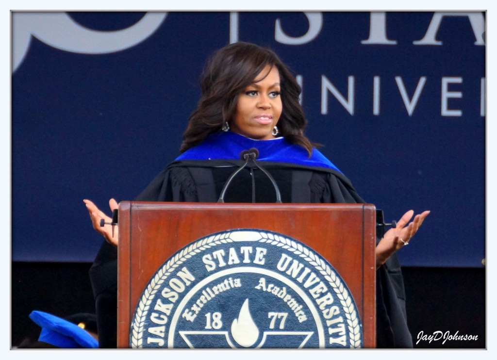 First Lady Michelle Obama addresses the nearly 800 graduates Saturday at Mississippi Veterans Memorial Stadium. PHOTO BY JAY JOHNSON