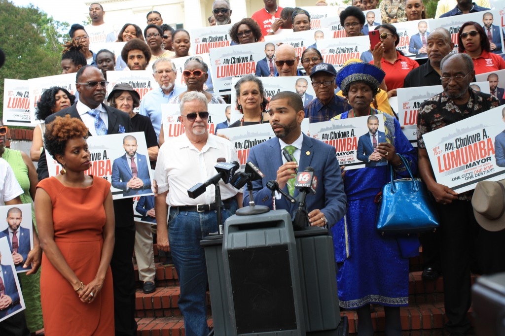 Attorney Chokwe Antar Lumumba speaks to supports and the media while announcing his candidacy for mayor of Jackson. His wife, Ebony Lumumba is at left. PHOTO BY SHANDERIA K. POSEY