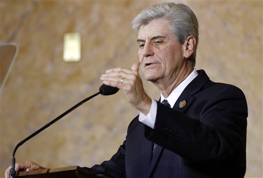 Gov. Phil Bryant delivers his 2015 State of the State address, during which he touted the state's financial well-being. Monday, Bryant called a special session of the legislature to address a $350 million budget shortfall. AP file photo