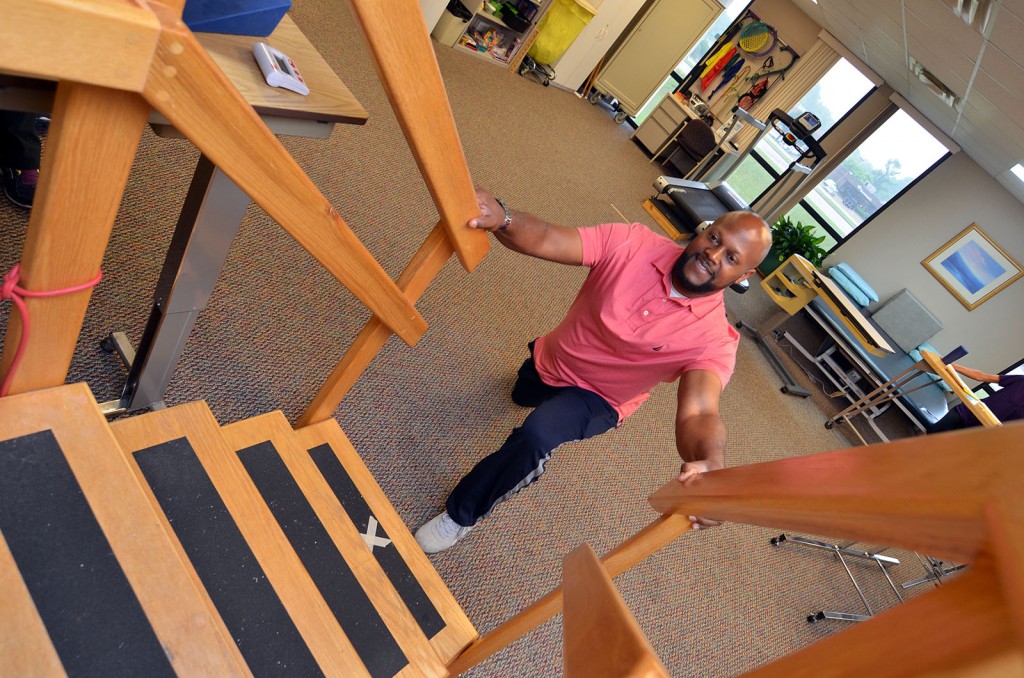 At Quest, MRC’s outpatient program, Karlos Taylor performs exercises to strengthen the muscles that were weakened by having a stroke.