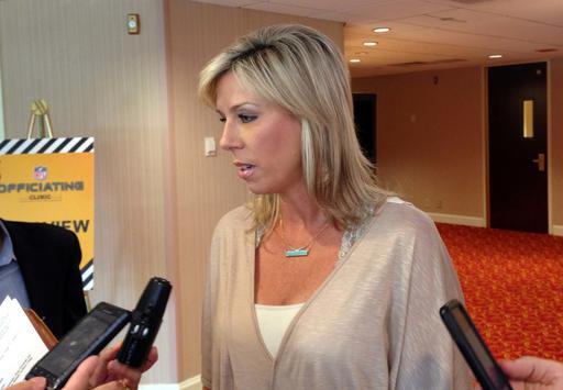 Sarah Thomas, the first female to be a full-time game official in the NFL, talks with reporters about her first season while at the annual NFL Officiating Clinic on Friday, July 15, 2016, in Irving, Texas. Thomas will again be the NFL's only female game official in 2016. (Stephen Hawkins/The Associated Press)