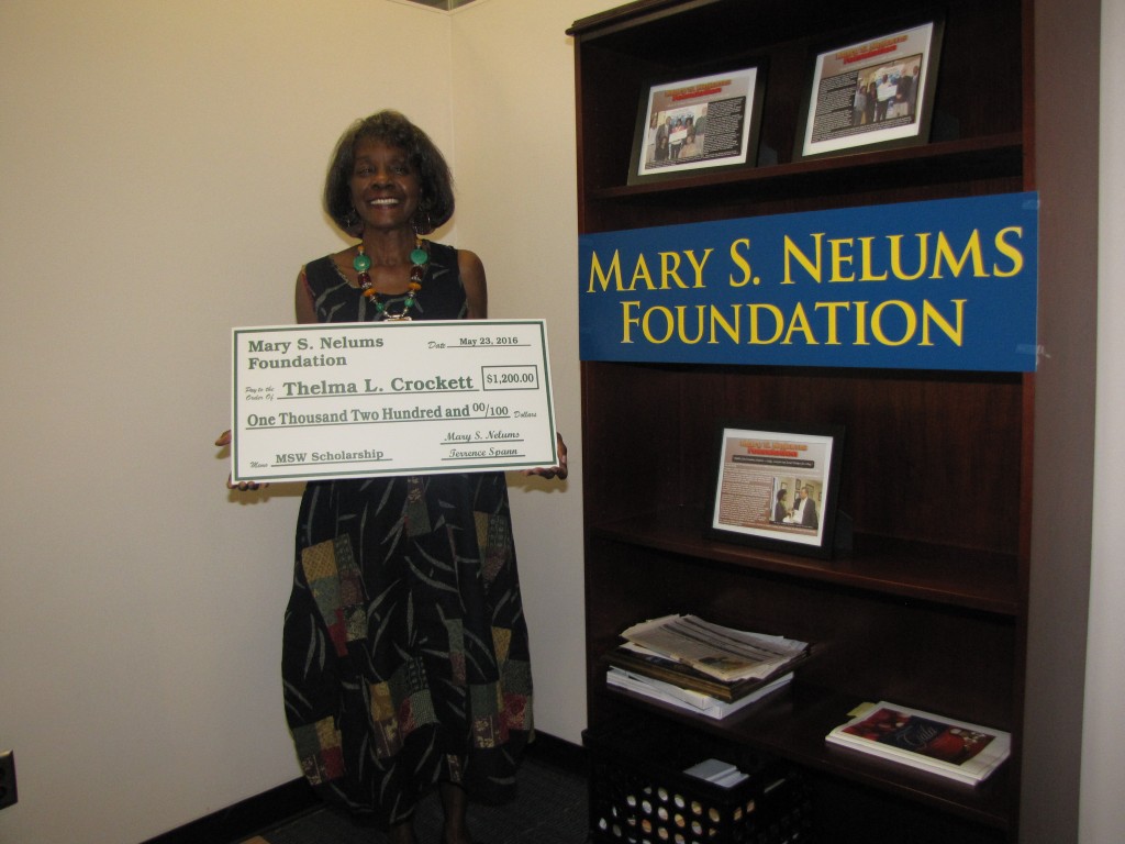 Mary S. Nelums, founder and president of the Mary S. Nelums Foundation, displays the check to Thelma Crockett as the scholarship recipient for the 2016 summer term. PHOTO BY JANICE K. NEAL-VINCENT