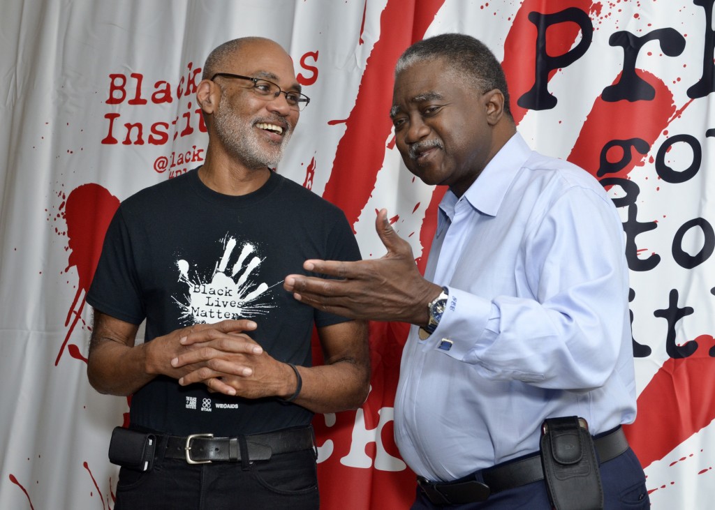 Phill Wilson (left), the president and CEO of the Black AIDS Institute, talks to George Curry at the 2016 International AIDS Conference in Durban, South Africa. Freddie Allen/AMG/BAI