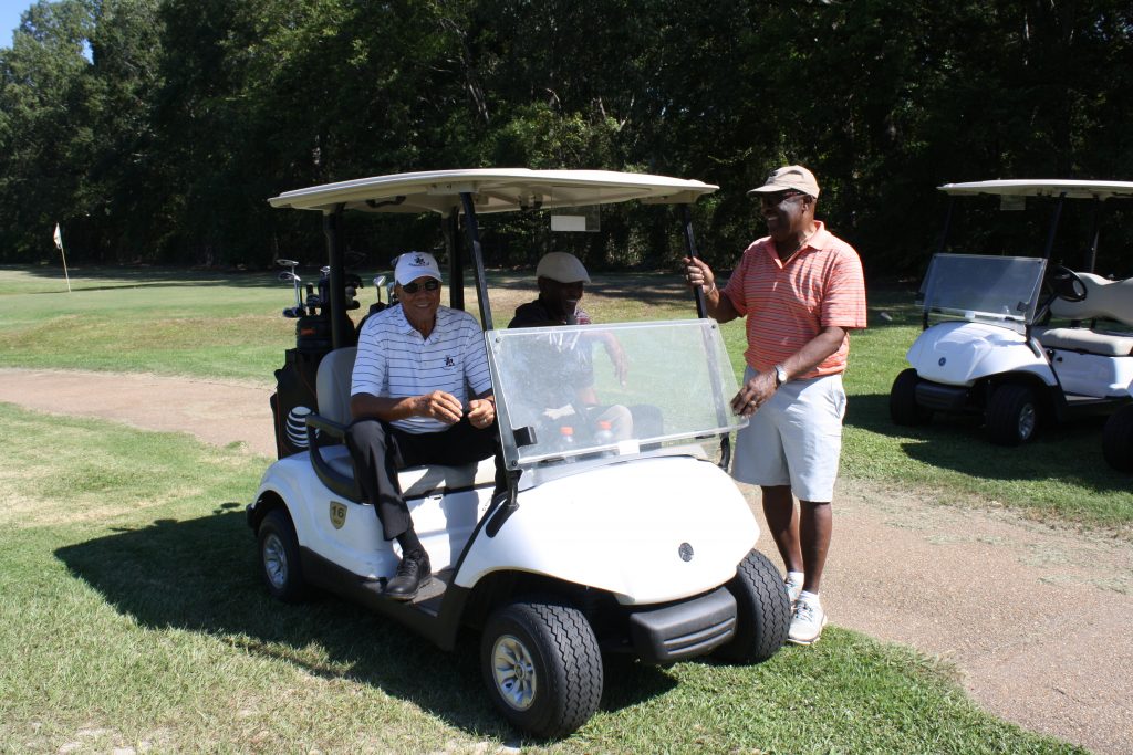 Judge Rueben Anderson (from left), Max Mayes and A.D. Jones at Grove Park Golf Course in Jackson Sept. 20. PHOTO BY SHANDERIA K. POSEY