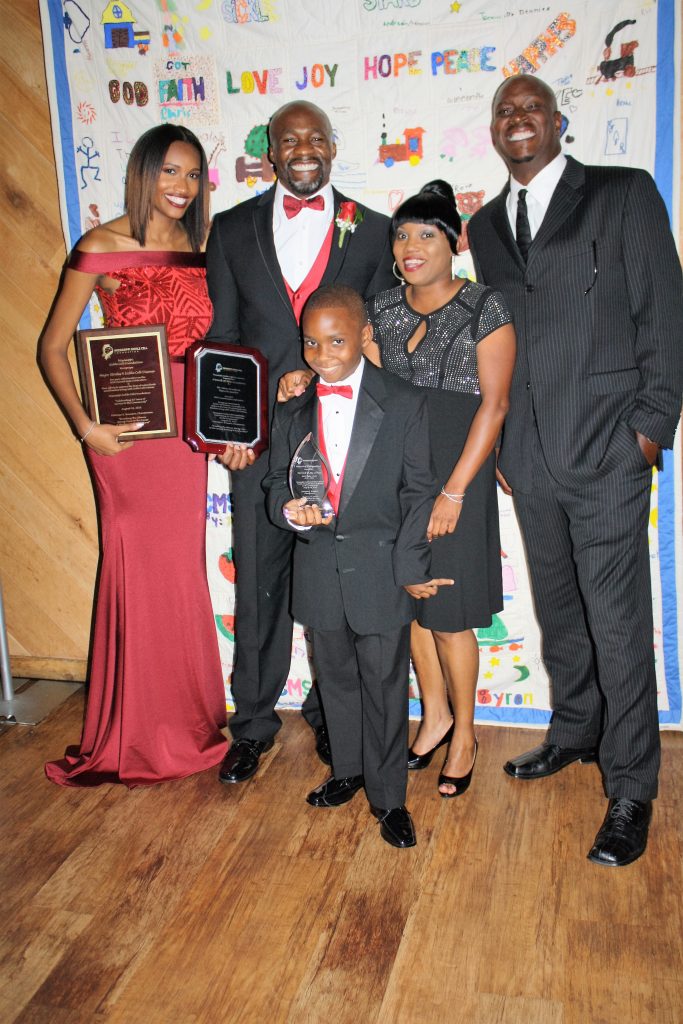 Attending the Mississippi Sickle Cell Foundation Gala were Derrick “DJay” James (front), MSCF Poster Child for 2016; La’Shon O’Neal (back row, from left), Corey Bradford, LaShaunda Davenport (DJay’s mom) and Derrick James (DJay’s father). PHOTO BY STEPHANIE R. JONES
