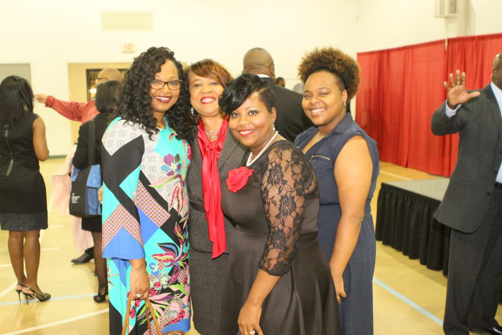 Tanesha Moody (from left), Jean Jacobs, Amy Johnson and Ariel Griffin at the ordination reception