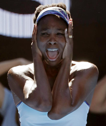 United States' Venus Williams celebrates after defeating compatriot Coco Vandeweghe during their semifinal at the Australian Open tennis championships in Melbourne, Australia, Thursday, Jan. 26, 2017. (AP Photo/Dita Alangkara)
