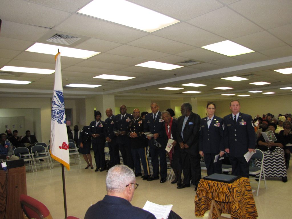 Standing: The Mississippi Air National Guard, special invited guests for the evening.
