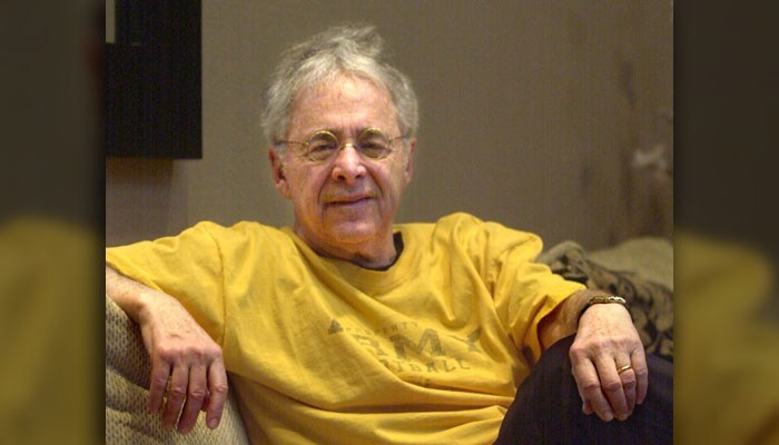 FILE - In this Dec. 20, 2002 file photo, Chuck Barris, the man behind TV's "The Dating Game," poses in the lobby of his apartment in New York. Game show impresario Barris has died at 87. Barris, the madcap producer of "The Gong Show" and "The Dating Game," died of natural causes Tuesday afternoon, March 21, 2017, at his home in Palisades, New York. (AP Photo/Bebeto Matthews, File)