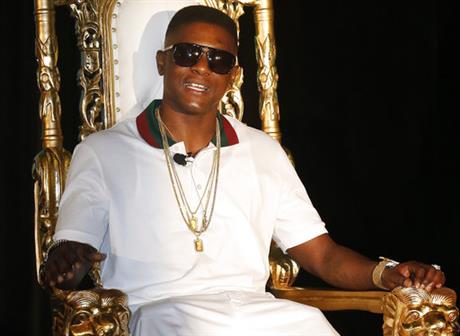 In this March 10, 2014 file photo, rapper Lil' Boosie, whose real name is Torence Hatch, appears at a news conference in New Orleans. Six men have been arrested after rapper Boosie Badazz attracted an unruly crowd Sunday, April 9, 2017 while shopping at a Mississippi mall. (AP Photo/Bill Haber, File)