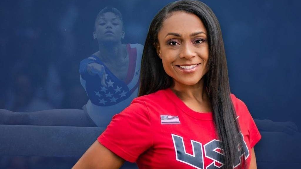 Former Olympic standout Dominique Dawes, now a mother of four, is focused on creating a healthy environment for children at her Maryland gymnastics facility. (Courtesy of Dominique Dawes)