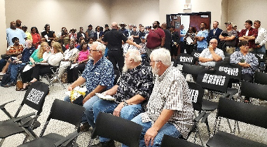 Brandon Police instructing all people standing – majority Black - out of the Boardroom and into the Civic Center across the hall.